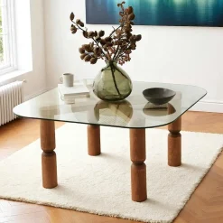 Table basse carrée en verre - pieds bois sculpté BOMA